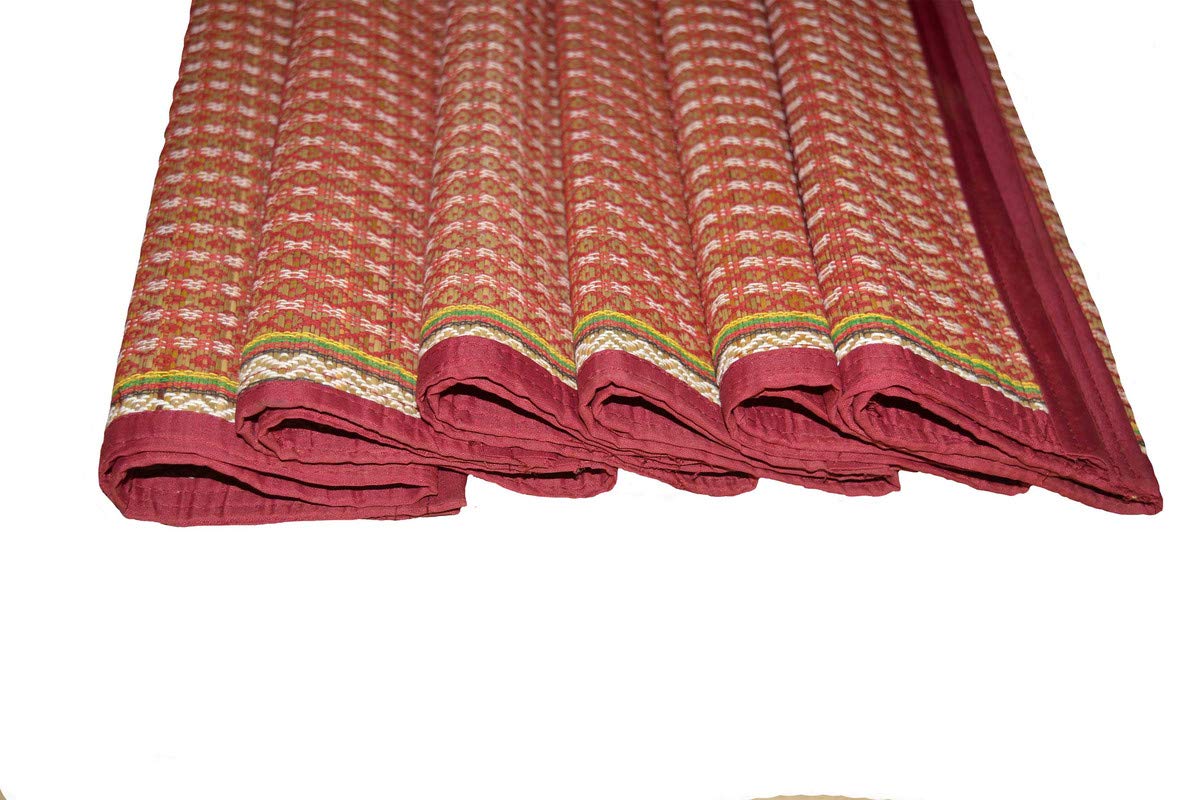 Madurkathi pooja mat folded and tied with cotton string for gifting