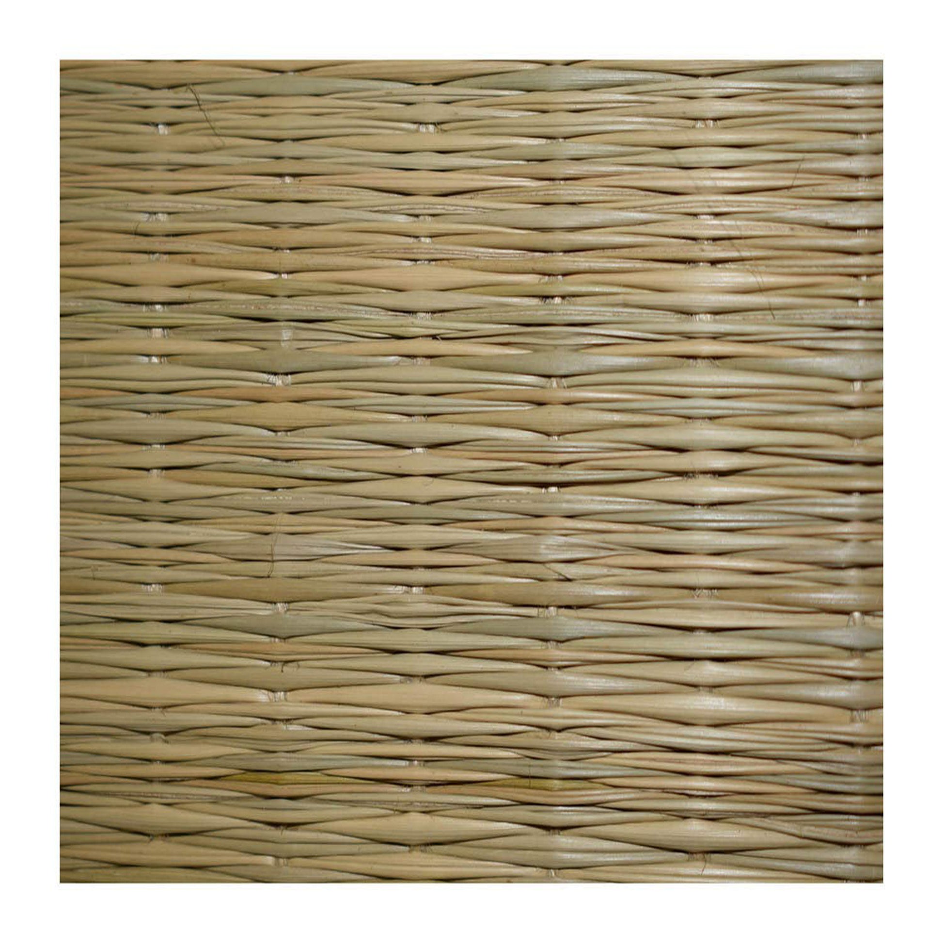 Handcrafted Madurkathi mat laid on tiled Indian floor